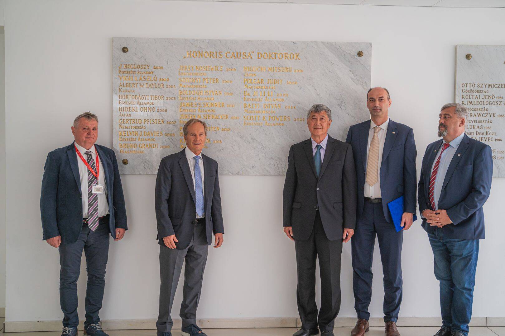 HUSS adds two more honorary doctors' name to the marble plaque